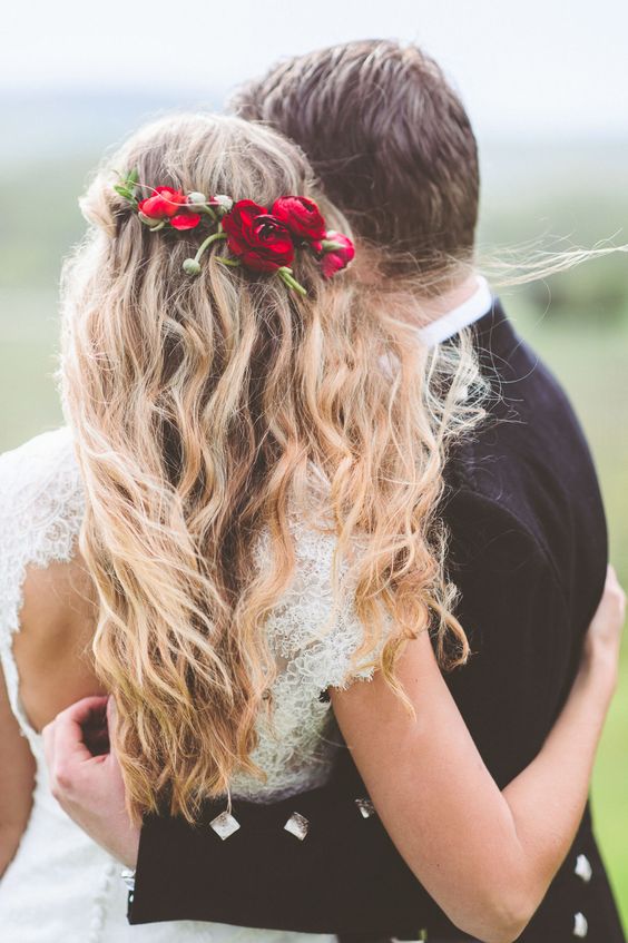half up half down wedding hairstyle with red flower crown