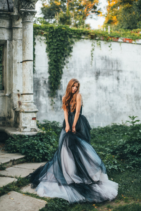 multiple tulle layers draped under the beaded lace embroidery black and white tulle wedding dress