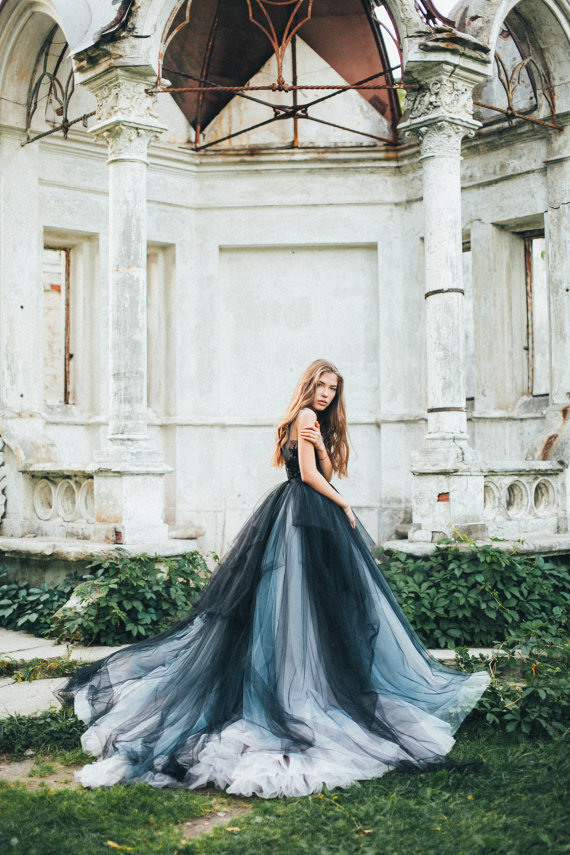 multiple tulle layers draped under the beaded lace embroidery black and white tulle wedding dress