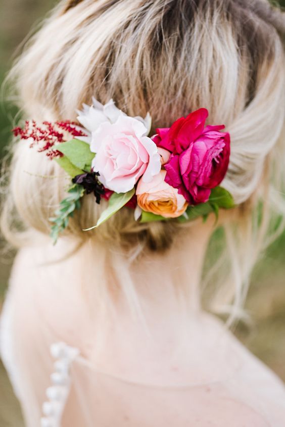 pink flower hair accessory - photo by Annmarie Swift