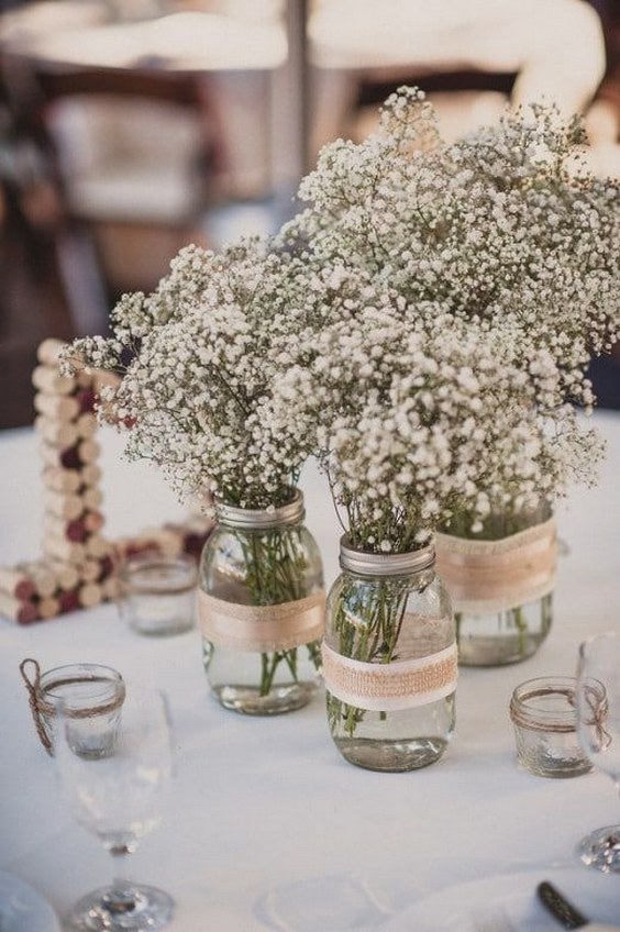 rustic baby's breath and mason jar wedding centerpiece