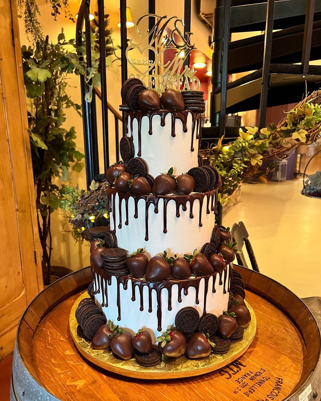 rustic drip chocolate wedding cake with chocolate strawberry and oreo cookies via customcakesbyadele