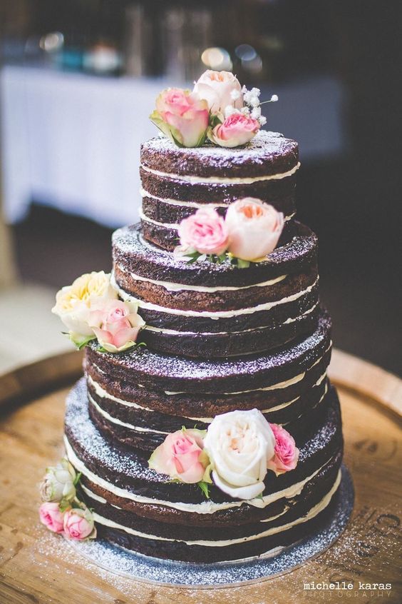 rustic naked wedding cake with pink roses