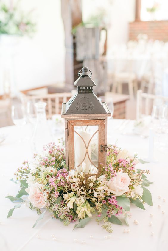 rustic wildflowers and wood lantern wedding centerpiece