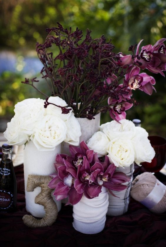 twine wrapped purple table number centerpiece