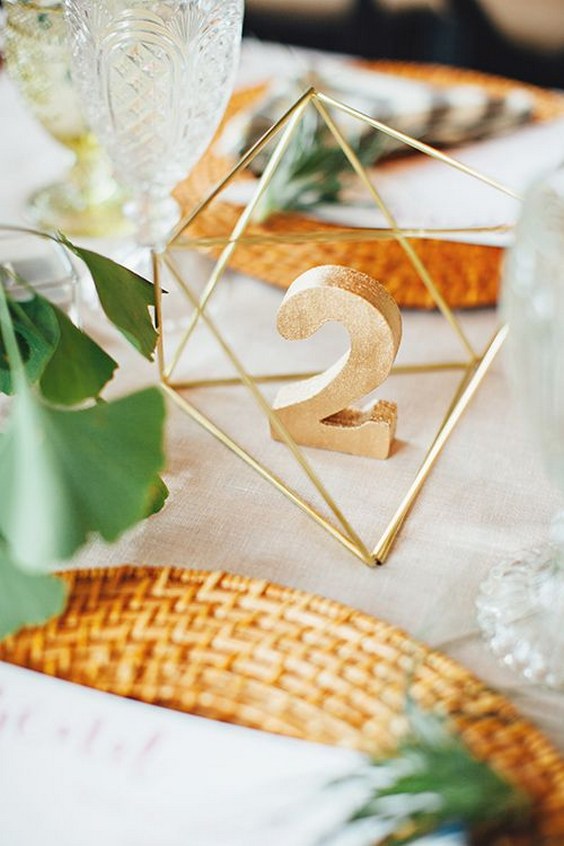 Gold table numbers are luxe accents to otherwise casual decorations