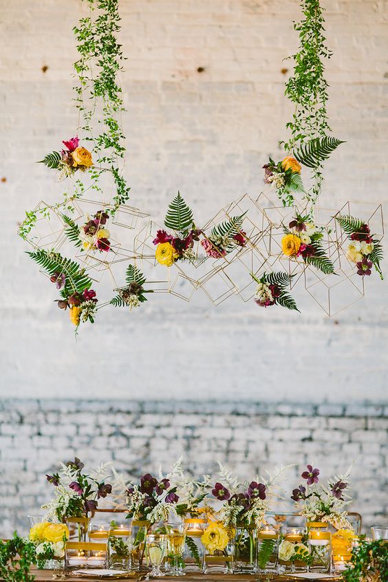 Modern vine-covered wire installation decor - Photography Redfield Photography