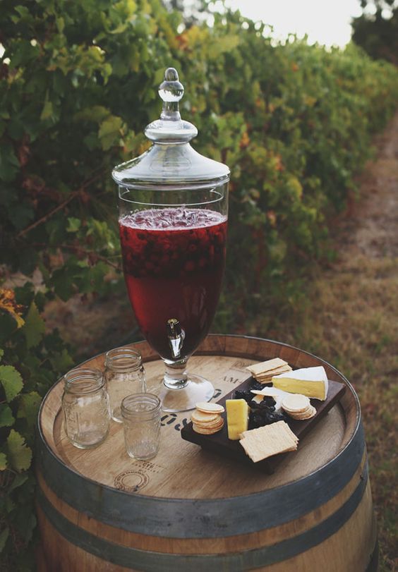 sangria, mason jars, cheeses among the grape vines