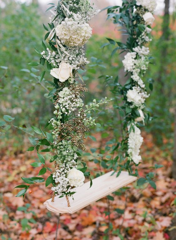 Ivory rose laced swing with Falling leaves for an Autumn wedding tale