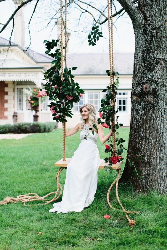 Rose and jasmine covered wedding swing