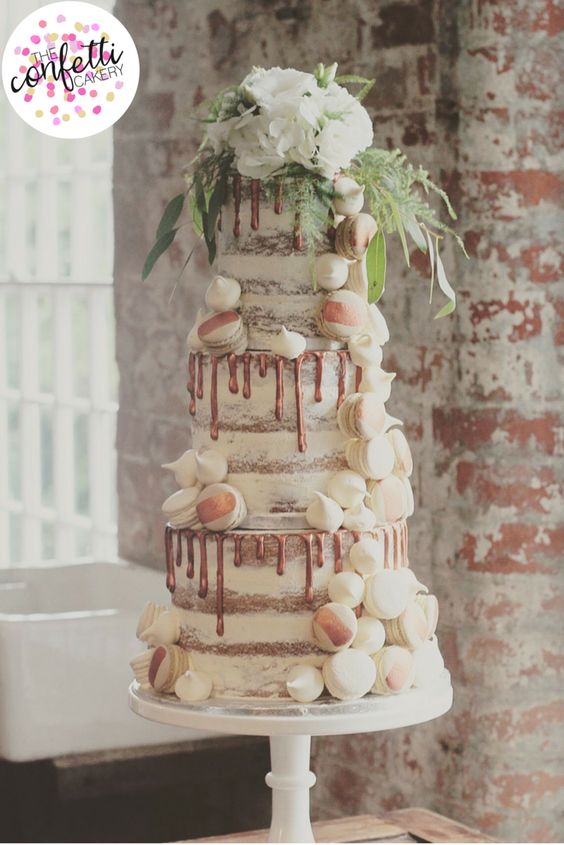 Semi-naked copper drip wedding cake, with vanilla and coffee macarons and meringue kisses by The Confetti Cakery