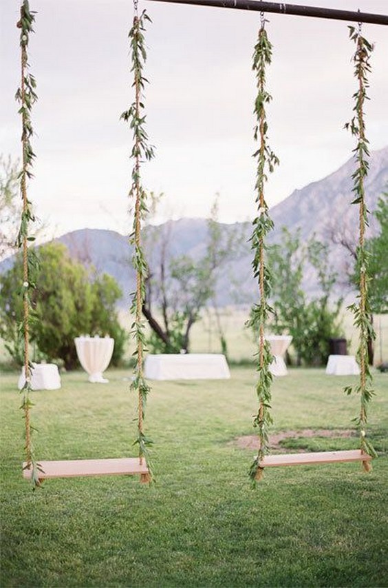 Swings for a garden wedding Photo by Jose Villa