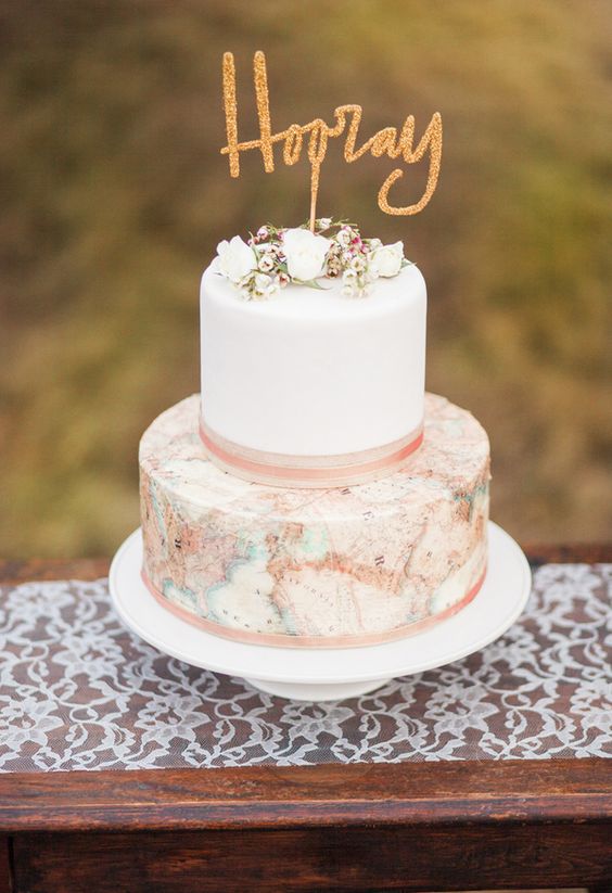 Travel-themed cake, printed map, gold Hooray cake topper via Meredith Jane Photography