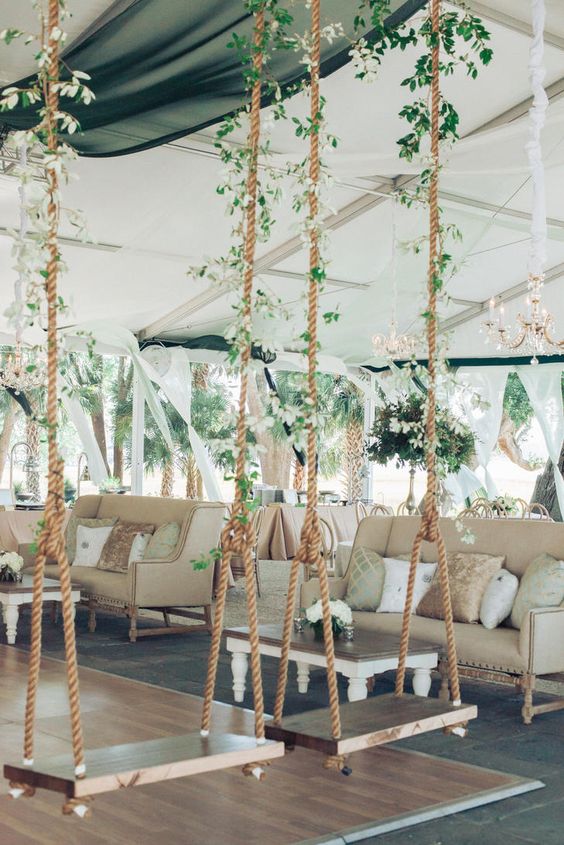 Whimsical wooden swings in reception area