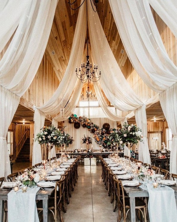 barn wedding reception ideas with draping fabric 2