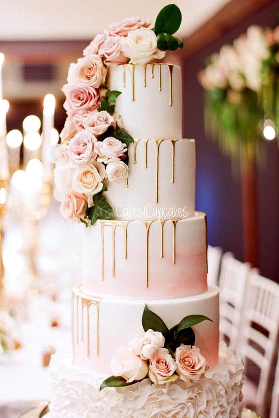 blush pink drip wedding cake