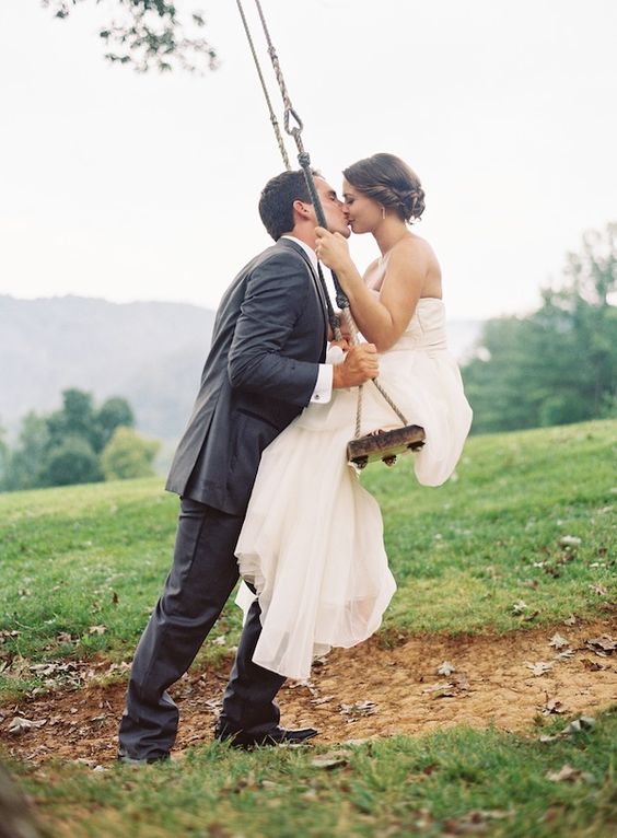 perfect swing kiss wedding photo
