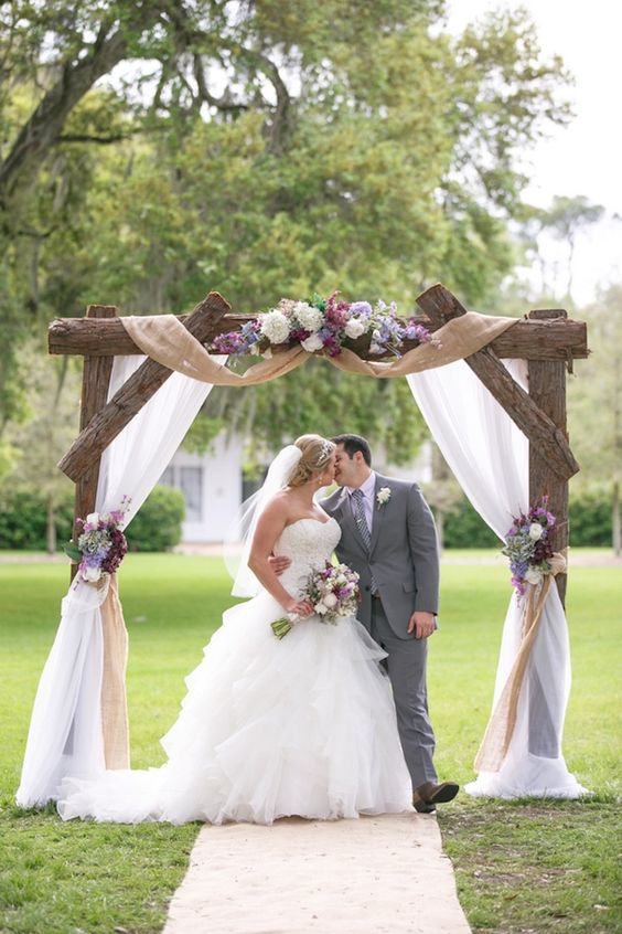 rustic burlap and wooden wedding arch