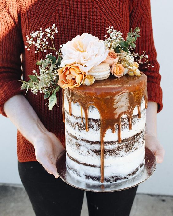 salted caramel drip layer cake with fresh flower topper Created by Sunshine Coast bakery Tome