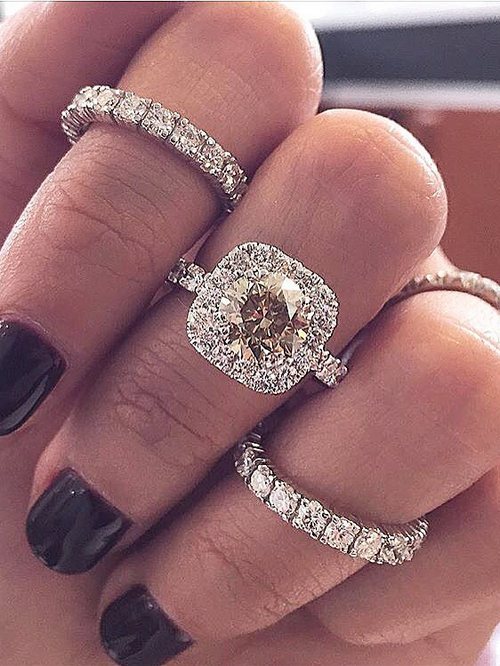 Engagement ring and wedding rings from Jean Pierre Jewelers 28