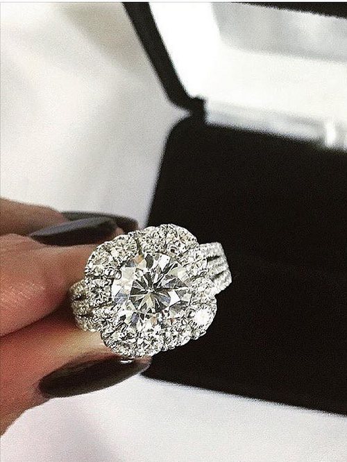 Engagement ring and wedding rings from Jean Pierre Jewelers 31