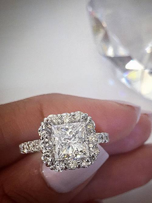 Engagement ring and wedding rings from Jean Pierre Jewelers 36