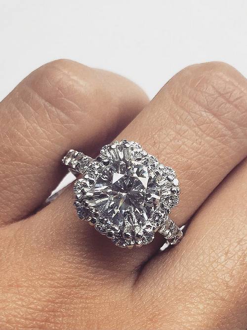 Engagement ring and wedding rings from Jean Pierre Jewelers 42