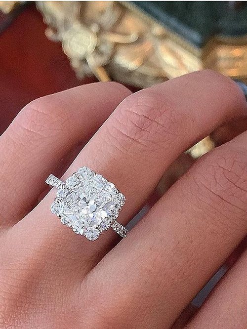 Engagement ring and wedding rings from Jean Pierre Jewelers 44