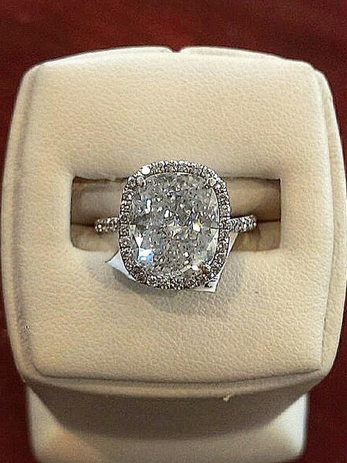 Engagement ring and wedding rings from Jean Pierre Jewelers 46