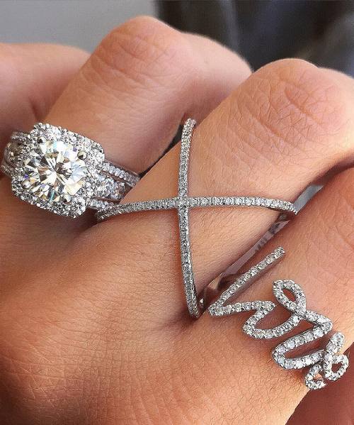 Engagement ring and wedding rings from Jean Pierre Jewelers 48
