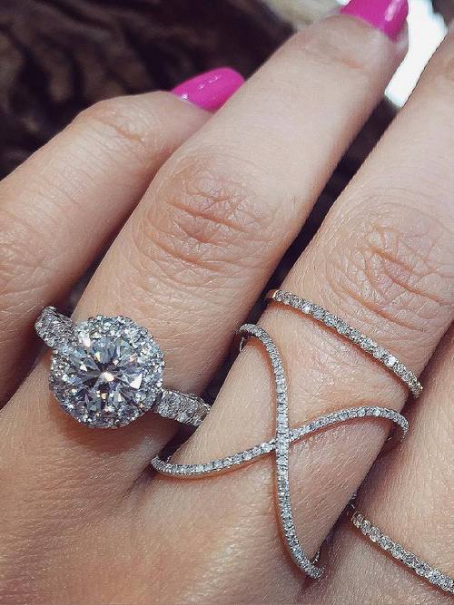 Engagement ring and wedding rings from Jean Pierre Jewelers 53