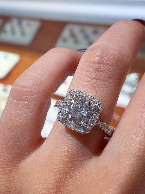 Engagement ring and wedding rings from Jean Pierre Jewelers 57