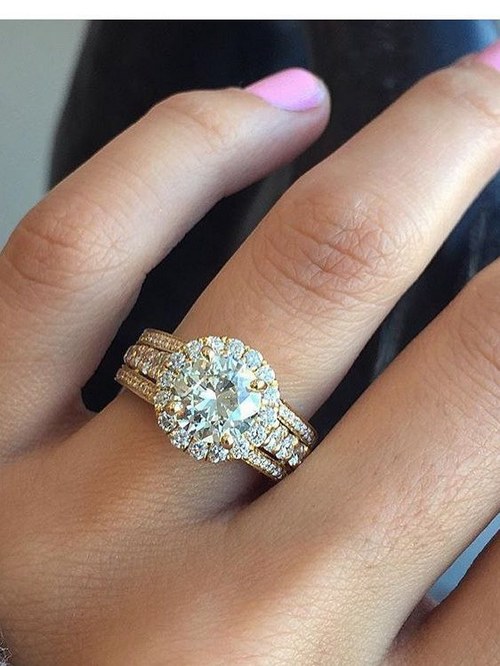 Engagement ring and wedding rings from Jean Pierre Jewelers 58