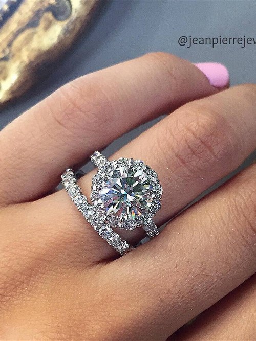 Engagement ring and wedding rings from Jean Pierre Jewelers 59