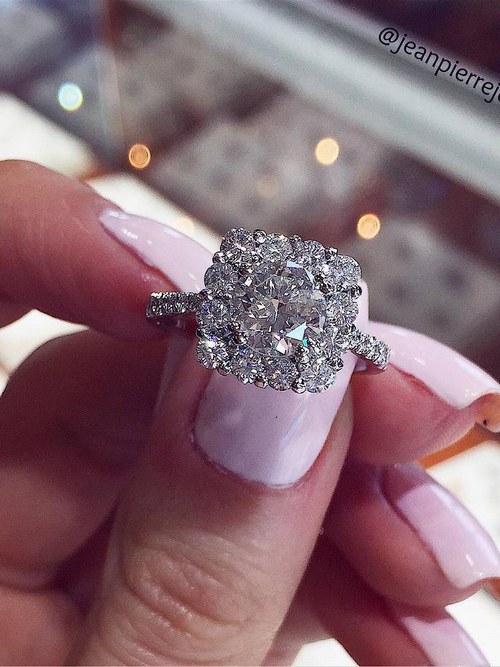 Engagement ring and wedding rings from Jean Pierre Jewelers 61