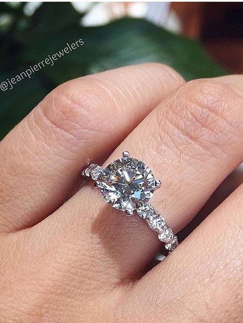Engagement ring and wedding rings from Jean Pierre Jewelers 62