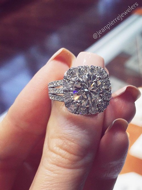 Engagement ring and wedding rings from Jean Pierre Jewelers 63