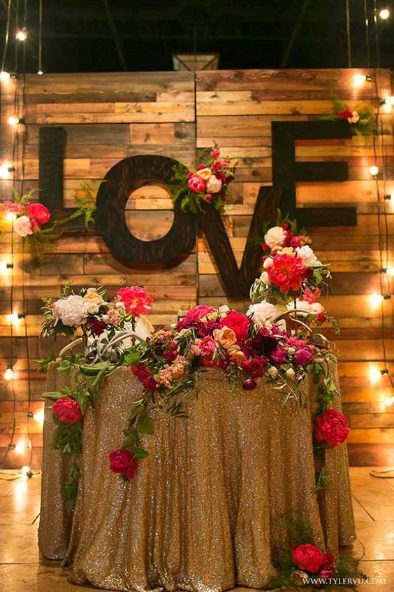 Top 20 Rustic Wedding Sweetheart Table Ideas 2024 7 Luxurious Gold Sequin and Peony Adorned Botanical Sweetheart Table