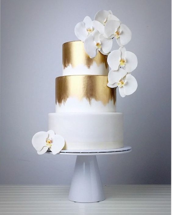 White and gold wedding cake