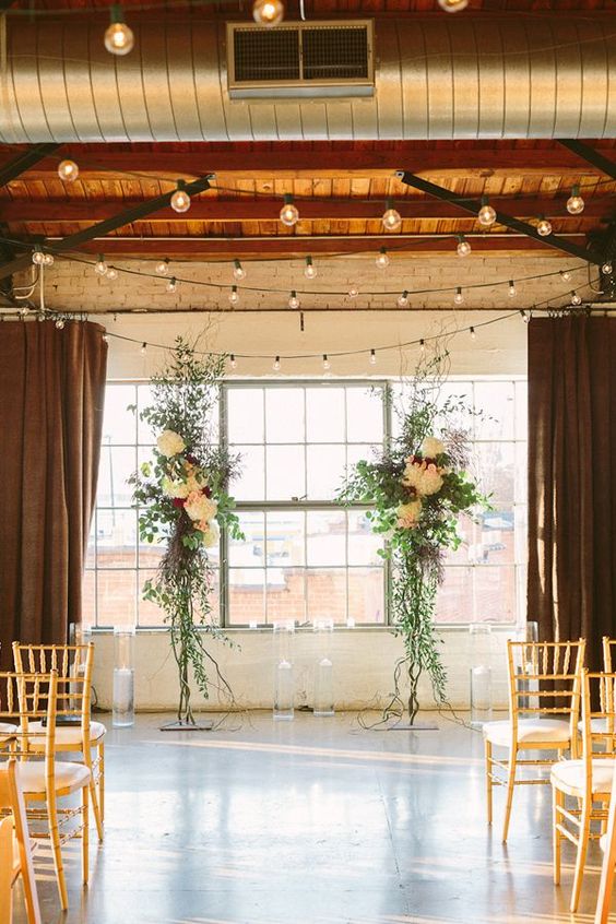 industrial greenery wedding arch