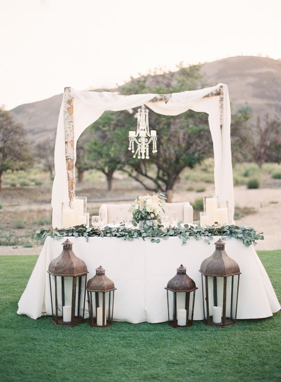 rustic greenery sweetheart table decor for the bride + groom