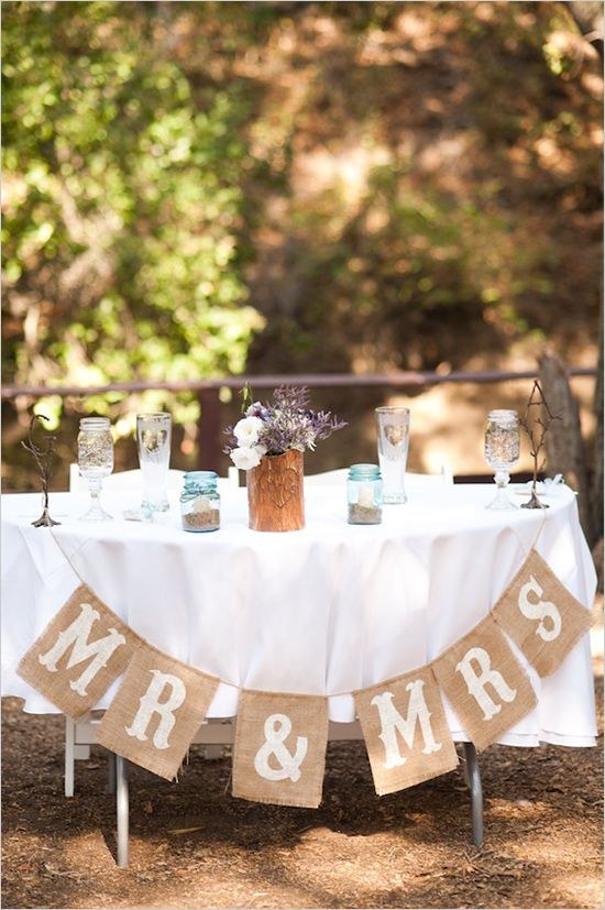 rustic sweetheart table with burlap banners