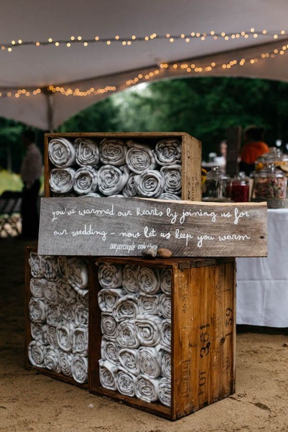 Blankets as favors for chilly outdoor weddings