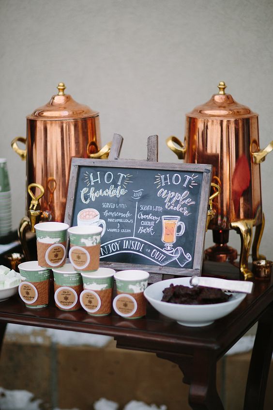 Hot chocolate and cider bar at winter wedding