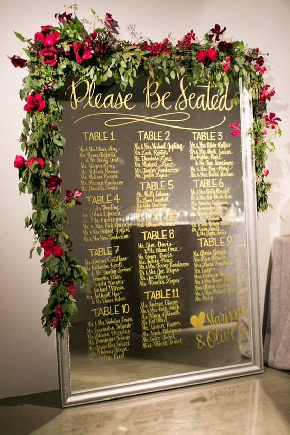 Mirror Seating Chart with Greenery + Red Florals