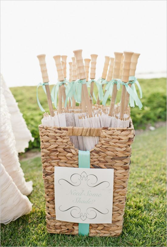 Top 14 Awesome Tips For An Outdoor Wedding 19 Ribbon tied around each handle carries out the color theme