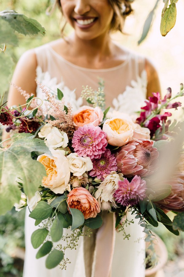 pink roses and greenery wedding bouquet