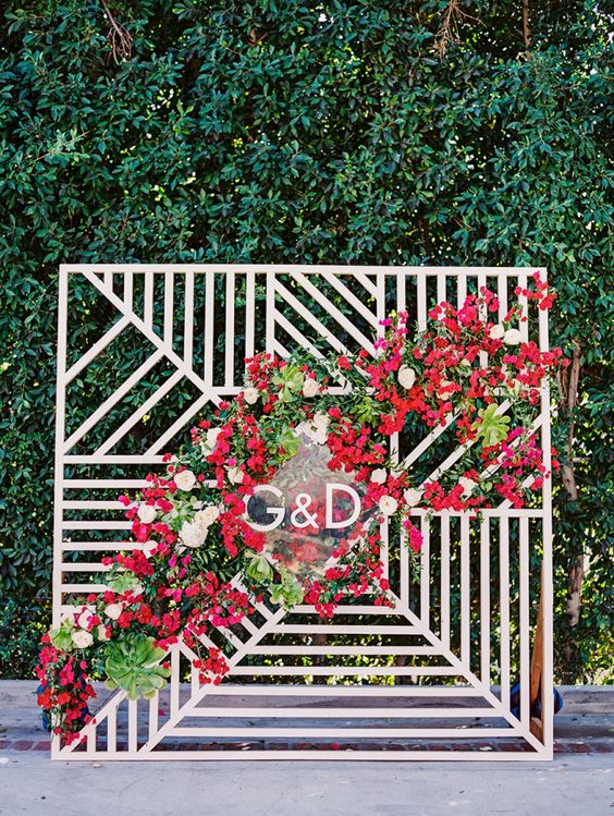 Cascading florals wedding sign and backdrop