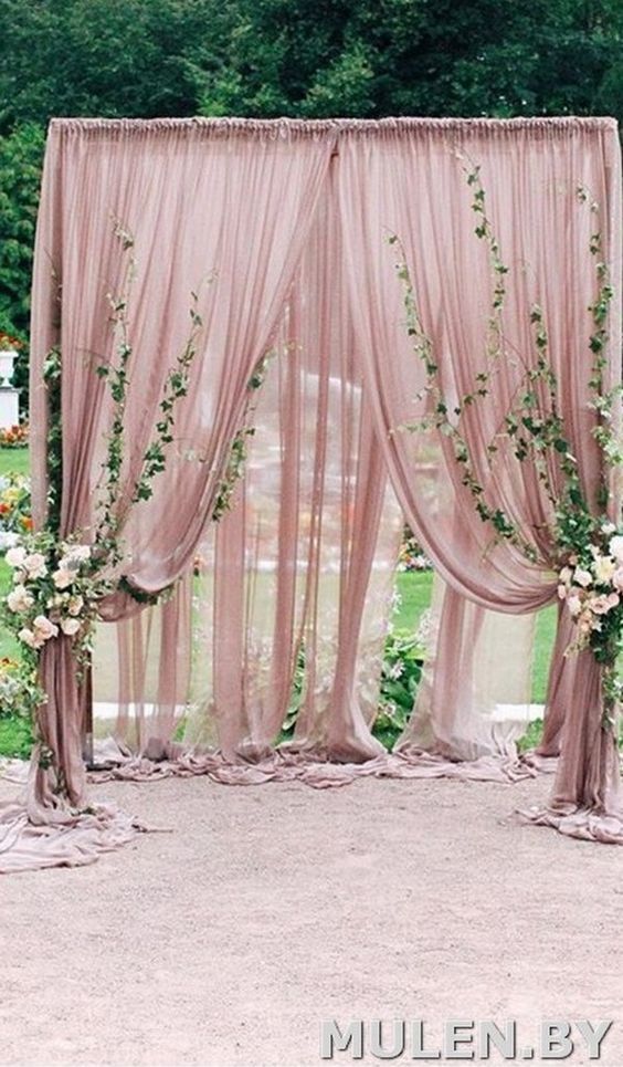 Dusty rose wedding arch
