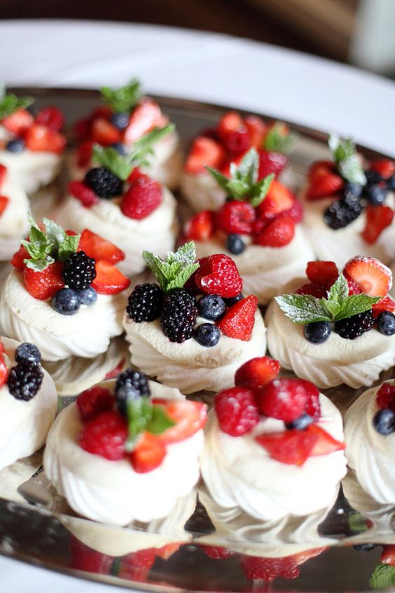 Pavlova wedding dessert with fresh berries